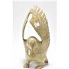 Image 1 : Carved soapstone sculpture of a bird with up stretched wings, signed by artist Pavinaq Petaulassie. 