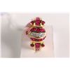 Image 1 : New old stock 18kt yellow gold, ruby and diamond ring. Set with 1.50ct of baguette channel set and r