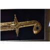 Image 2 : Gilt framed sword in gilt sheath set with gem like stones, overall size 17" wide and 48" long