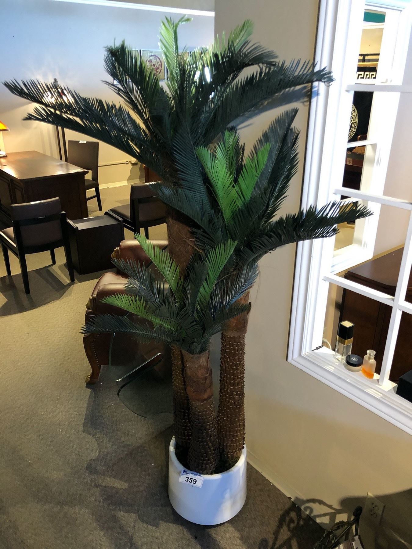 APPROX. 6.5' DECORATIVE POTTED PALM TREE  Able Auctions