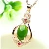Image 1 : Beautiful Carved Jade Stone Surrounded in Semi-Precious