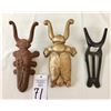 Image 10 : Group of Three Vintage Cast Iron Boot Jacks