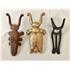 Image 1 : Group of Three Vintage Cast Iron Boot Jacks