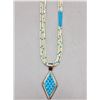 Image 1 : Carved Turquoise Pendant with Heishi Necklace