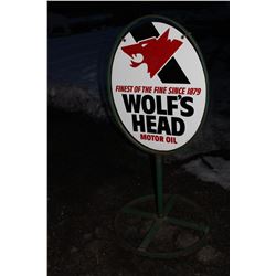 WOLFS HEAD MOTOR OIL CURB SIGN