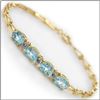 Plated 18KT Yellow Gold 5.29ctw Blue Topaz and Diamond Bracelet