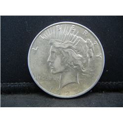 1927 D Nearly AU Peace Dollar