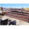 Image 3 : Rack of drill steel, about 100.  Round and octagon, 1 1/2 in dia.  Mostly 12 ft lengths  (114181)