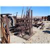 Image 1 : Rack of drill steel.  About 50-60, range from 6 to 8 ft lengths.  (114183)
