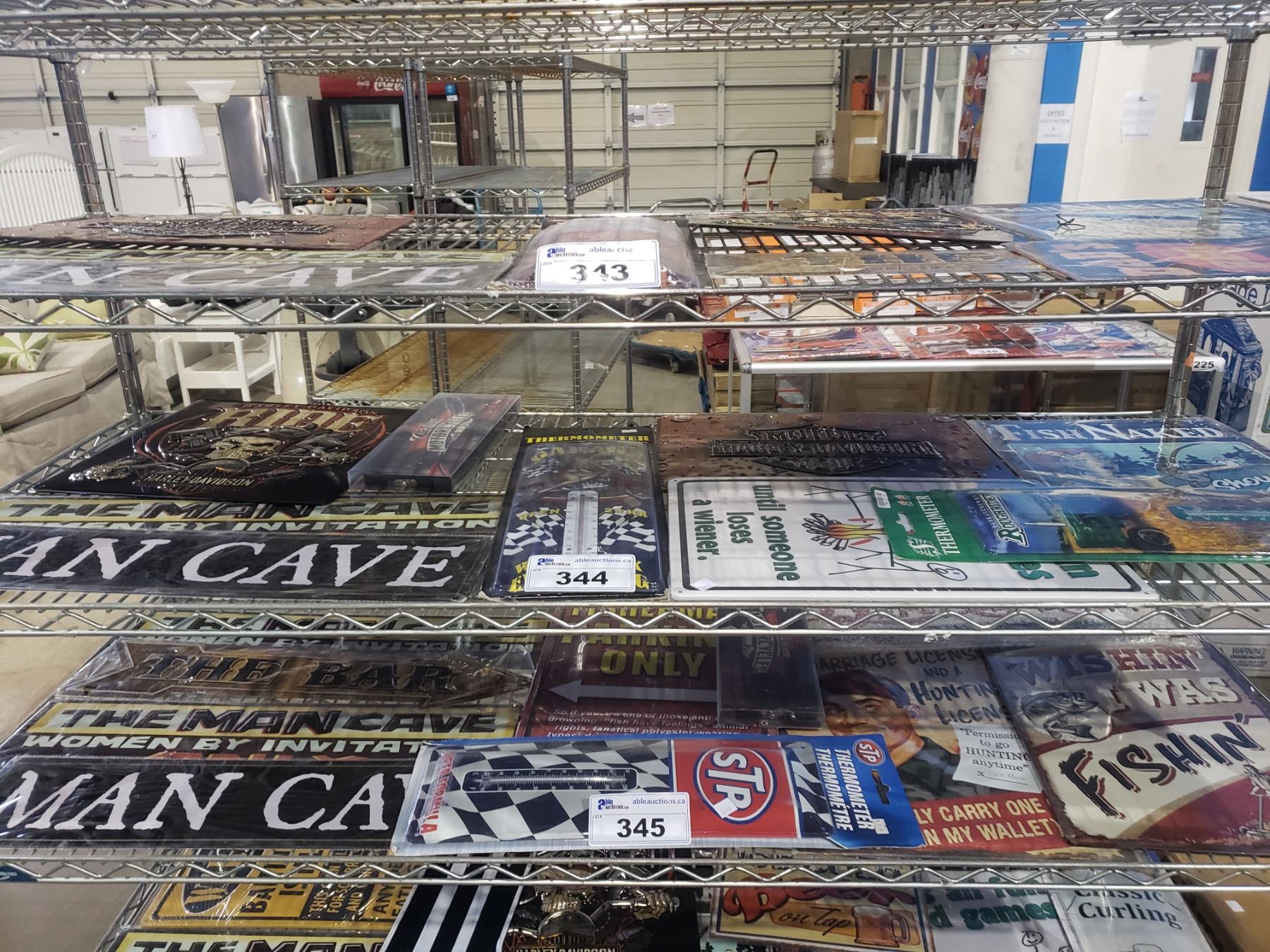 SHELF OF ASSORTED SIGNS