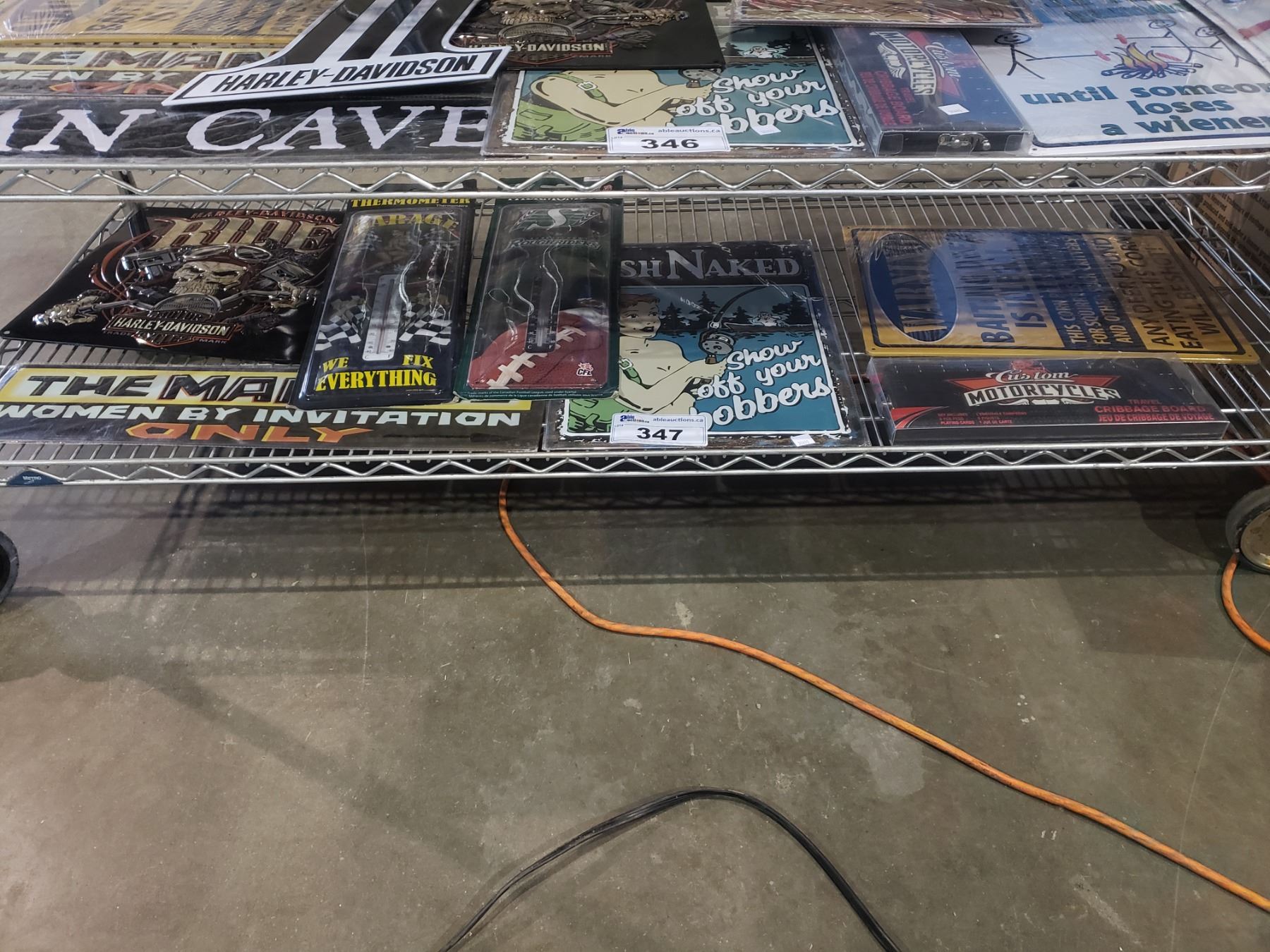 SHELF OF ASSORTED SIGNS