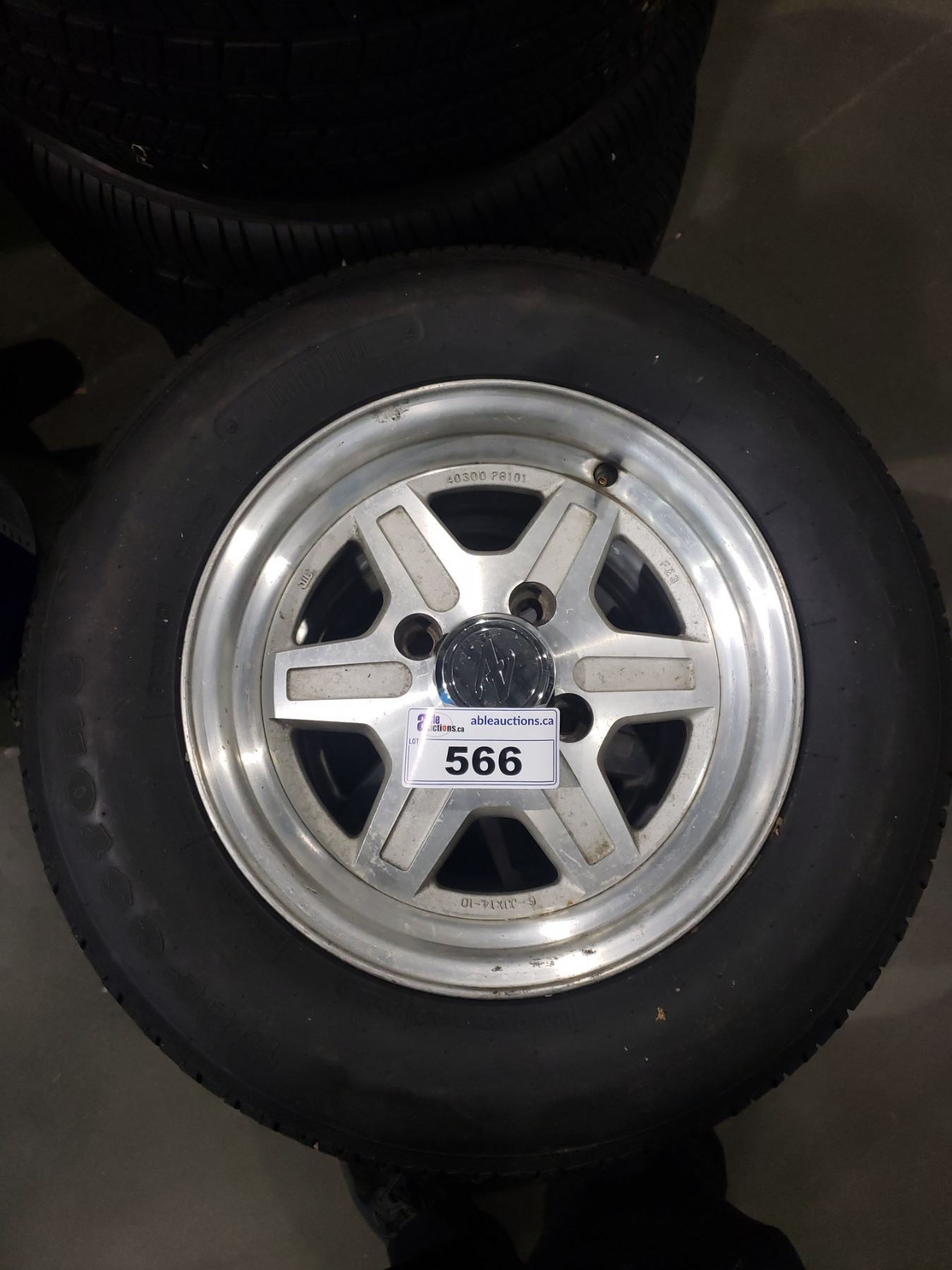 SET OF 4 FIRESTONE P195/70R14 TIRES ON RIMS