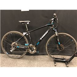 BLACK AND BLUE TREK DUAL SPORT 24 SPEED FRONT SUSPENSION TRAIL BIKE WITH FRONT AND REAR DISC