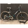 Image 1 : BLACK AND BLUE TREK DUAL SPORT 24 SPEED FRONT SUSPENSION TRAIL BIKE WITH FRONT AND REAR DISC