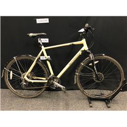 SAND YELLOW HARO BRIDGEPORT 21 SPEED FRONT SUSPENSION TRAIL BIKE WITH FRONT AND REAR DISC BRAKES,