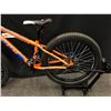 Image 8 : ORANGE AND BLUE CCM TRAILHEAD 21 SPEED FRONT SUSPENSION FAT TIRE MOUNTAIN BIKE WITH FRONT AND REAR