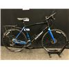 Image 1 : BLACK AND BLUE RALEIGH CADENT 27 SPEED HYBRID TRAIL BIKE WITH FRONT AND REAR HYDRAULIC DISC BRAKES