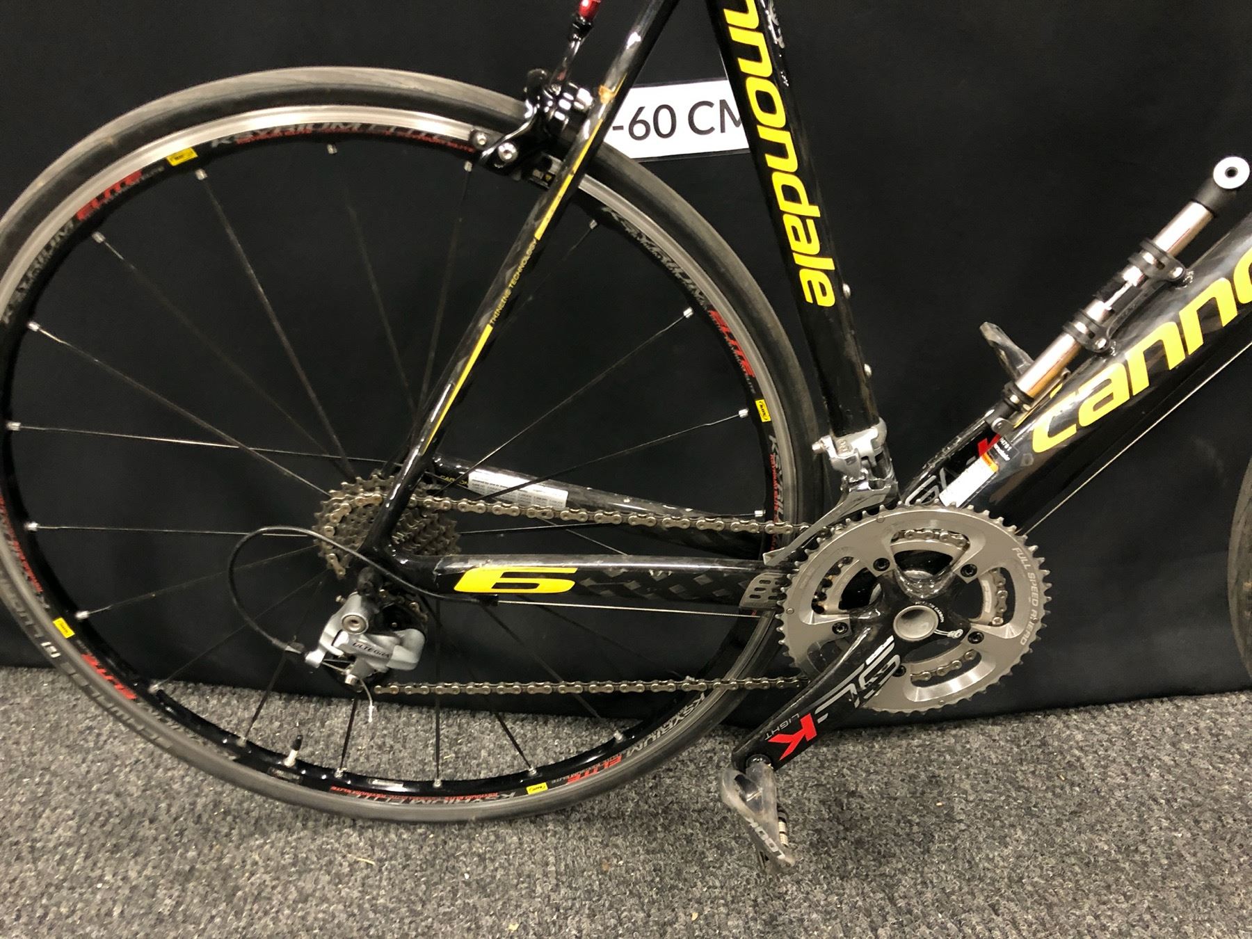 YELLOW AND BLACK CANNONDALE SIX 20 SPEED ROAD BIKE WITH CLIP PEDALS 54 yellow-and-black-cannondale-six-20-speed-road-bike-with-clip-pedals-54