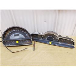 2 old vehicle speedometers