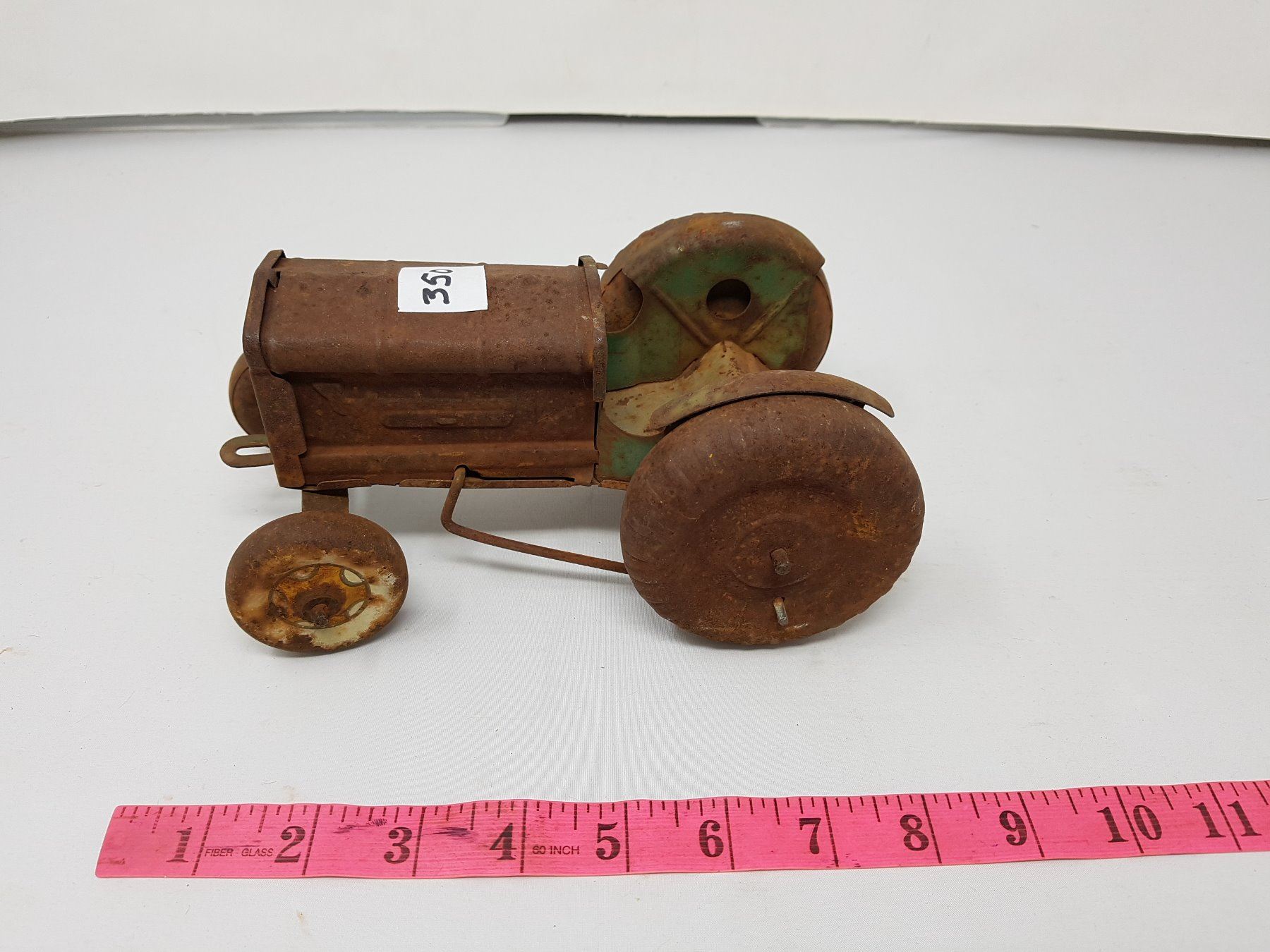 VERY OLD TIN TRACTOR