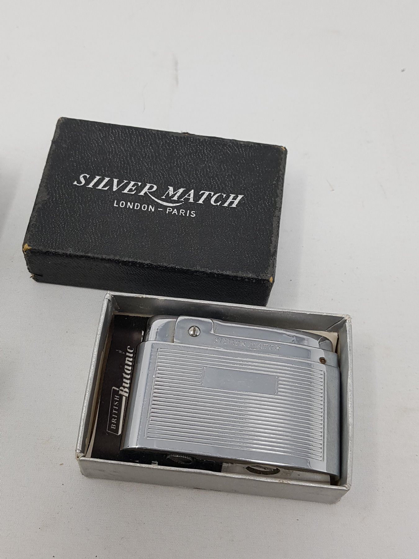 NOS VINTAGE SILVER MATCH LIGHTER (MADE IN ENGLAND) Schmalz Auctions