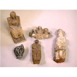 A GROUP OF FOUR SMALL STONE CARVINGSInc
