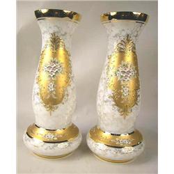 A PAIR OF PAINTED AND POLYCHROME-DECORA