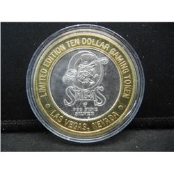 O’Sheas Las Vegas Nevada $10 (.999) silver gambling token.   In capsule.