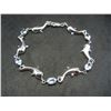 Image 1 : Seven-inch Sterling Bracelet with dolphin link design.