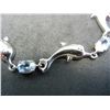 Image 2 : Seven-inch Sterling Bracelet with dolphin link design.