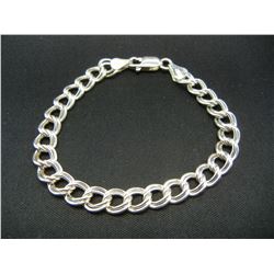 Seven-inch Sterling Bracelet with charm bracelet link design.   New.