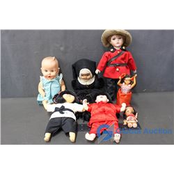 Collection of (7) Dolls including RCMP Doll