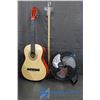 Image 1 : Acoustic Guitar (Missing Strings) and Fan