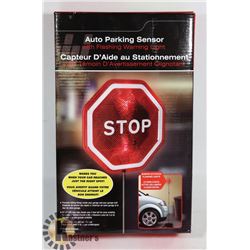 AUTO PARKING SENSOR WITH FLASHING WARNING LIGHT.