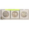 Image 1 : 1964/66/67 LOT OF 3 SILVER CANADIAN $1 DOLLAR COINS.