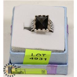.925 SILVER RING WITH BLACK STONE.
