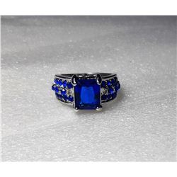 6)  LAB CREATED BLUE SAPPHIRE AND 10K
