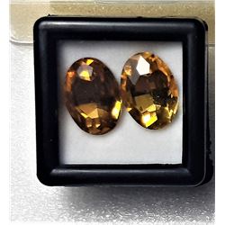 12)  LOT OF 2 MATCHED OVAL YELLOW ZIRCON