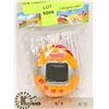 Image 1 : NEW TAMAGOTCHI TOY-ORANGE