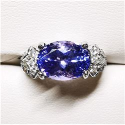 86) 10K WHITE GOLD TANZANITE AND DIAMOND RING,