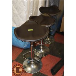 3 LEATHERETTE STOOLS WITH NO BACK.
