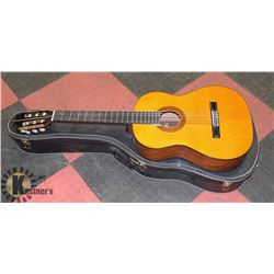 VINTAGE MEDALLION CLASSICAL GUITAR WITH CASE.