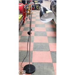 TALL BLACK ADJUSTABLE HEIGHT TILTING LAMP.