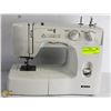 Image 1 : KENMORE SEWING MACHINE.