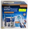 Image 1 : NEW WATERPIK WATER FLOSSER AND SONIC TOOH BRUSH