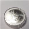 Image 2 : Silver Olympia 10Dollar C (~weight 54.77g), Suggested Retail Value $30 (Estimated Selling Price from