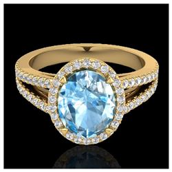3 Sky Blue Topaz & VS/SI Diamond Halo Ring 18K Yellow Gold - REF-69W3H - SKU:20934