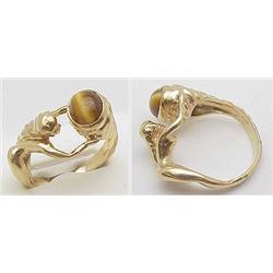 14kt yellow ring - woman holding a oval