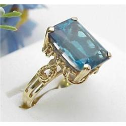 Ladys 10kt yellow gold blue topaz ring
