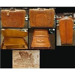 Hand tooled leather suit case in good u